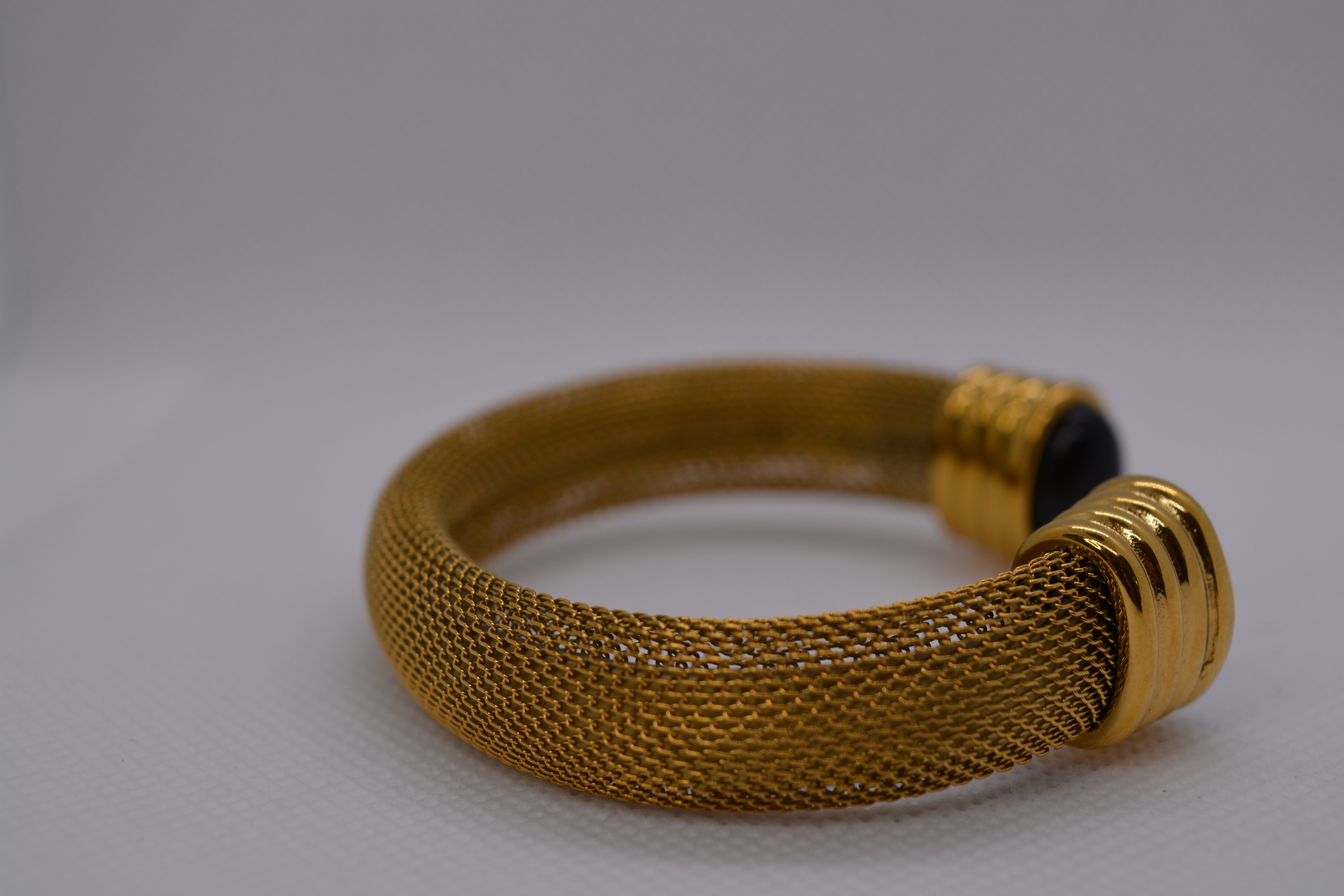 Bracciale rigido dorato maglia mesh